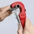 KNIPEX TubiX 90 31 02 BK – szybkie mocowanie na rurze jedną ręką